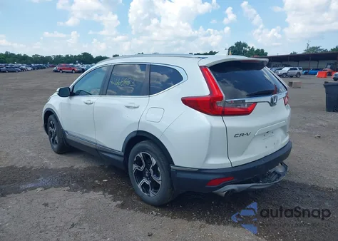 2018 Honda Cr-V Touring z USA, uszkodzony, nr VIN 5J6RW1H93JL002446